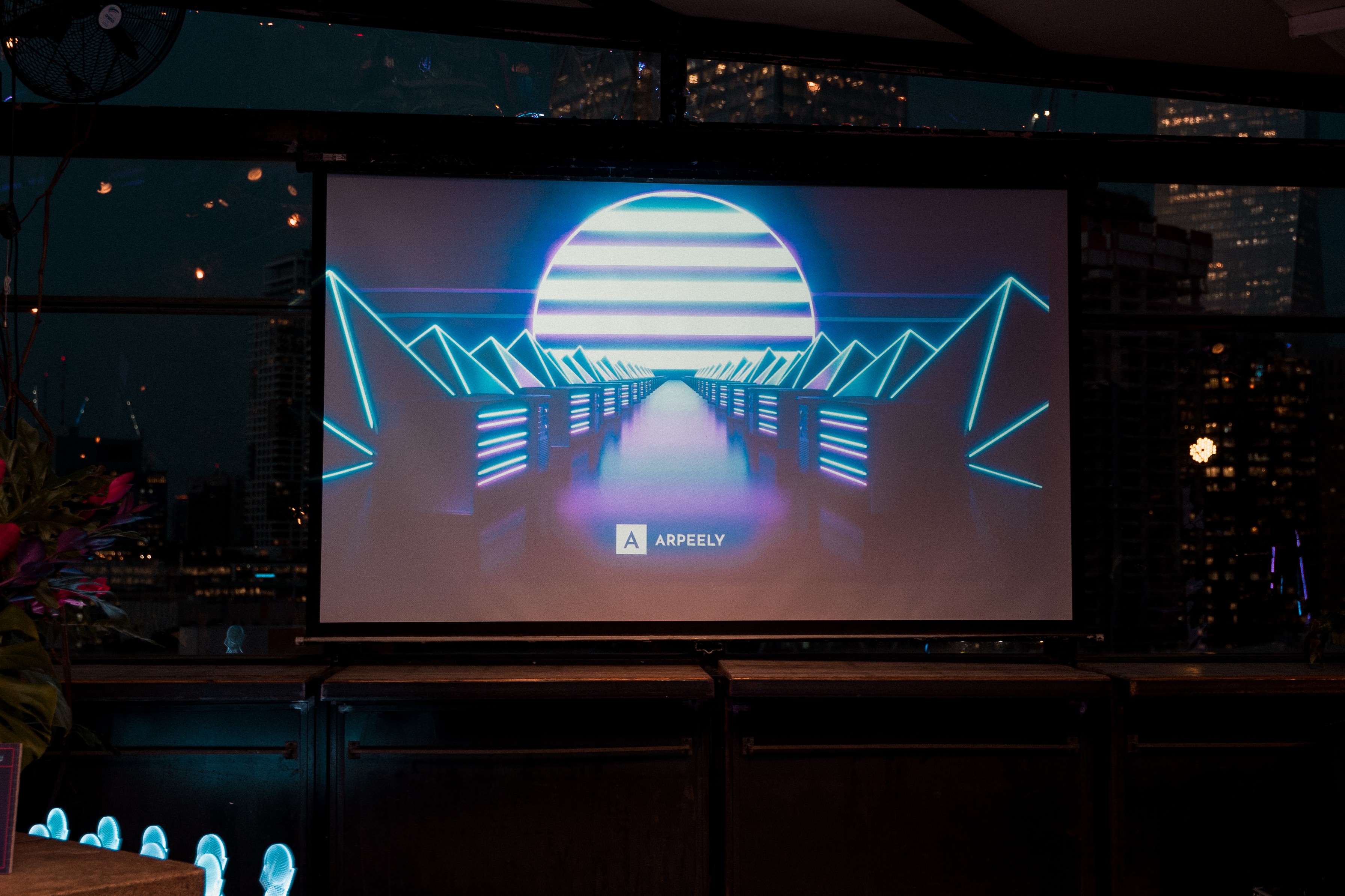 Graphic depicting a hexagonal cropped photo of an interior room design with grid lines along its borders.