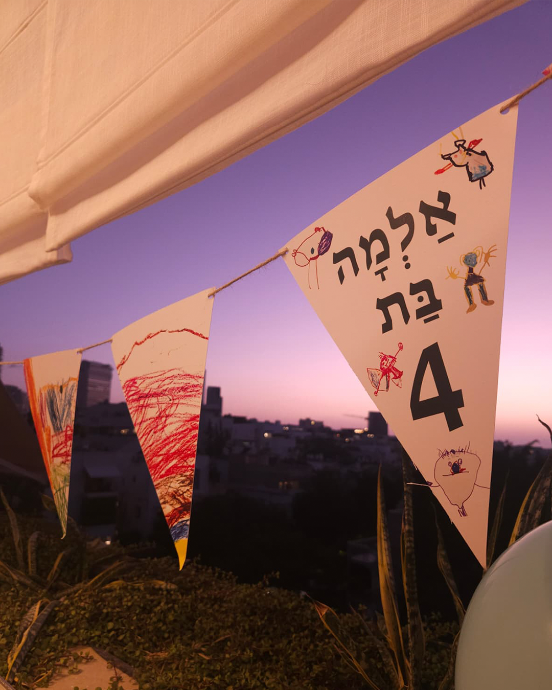 Photo of a man in a room using a tablet computer