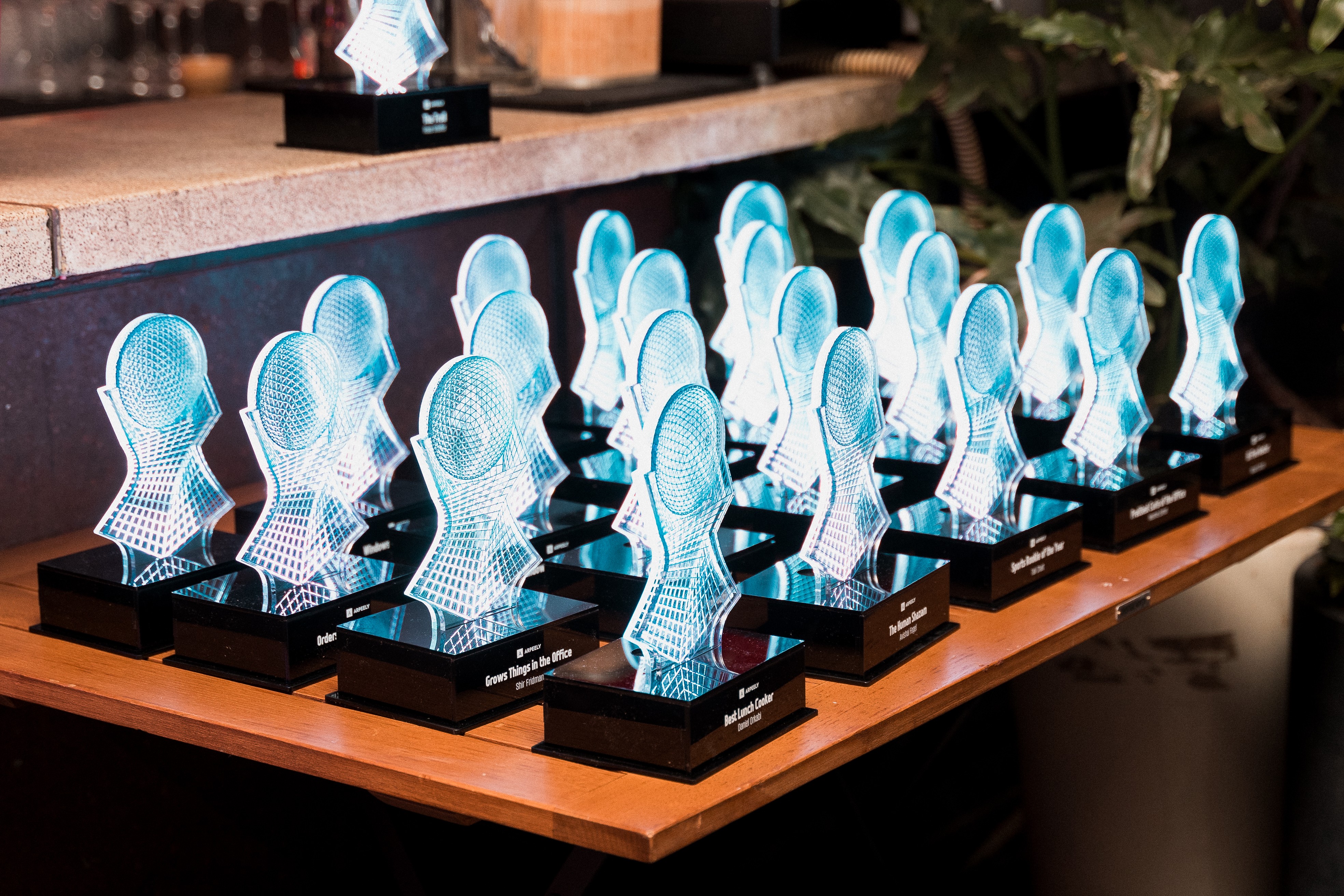 Graphic depicting UI-styled buttons with different categories of interior design items on top of an image of a modern interior living room.